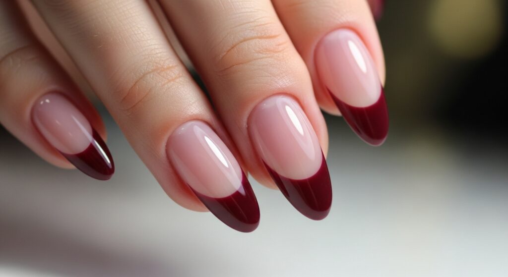 Short nails with burgundy French tips