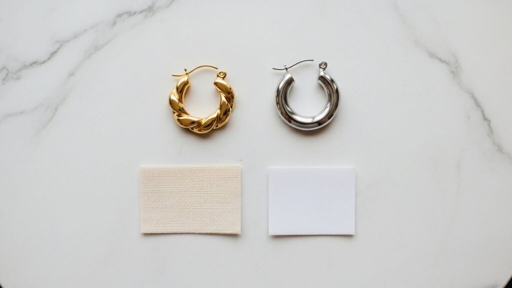 Gold vs silver jewelry and cream vs white fabric for skin undertone test.